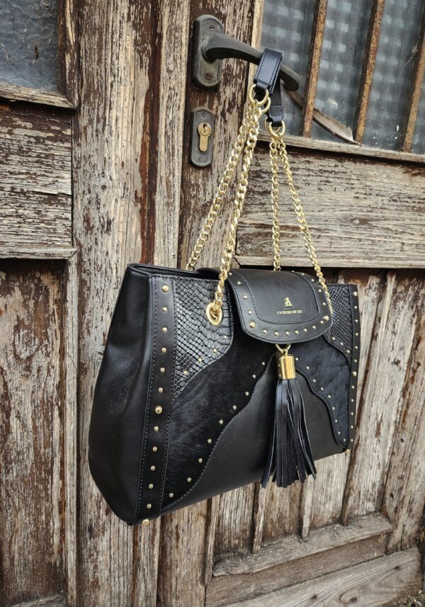 L ATELIER DU SAC Shopper con borchie stampa cocco e pelo cavallino nero www.vanityrivignano Calzature accessori uomo donna bambino